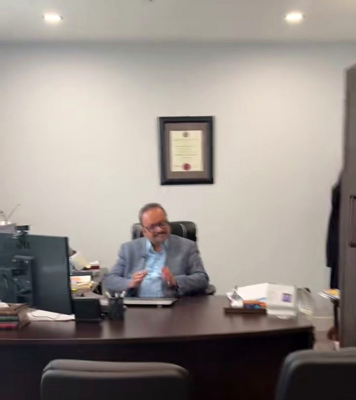 Ari at his desk